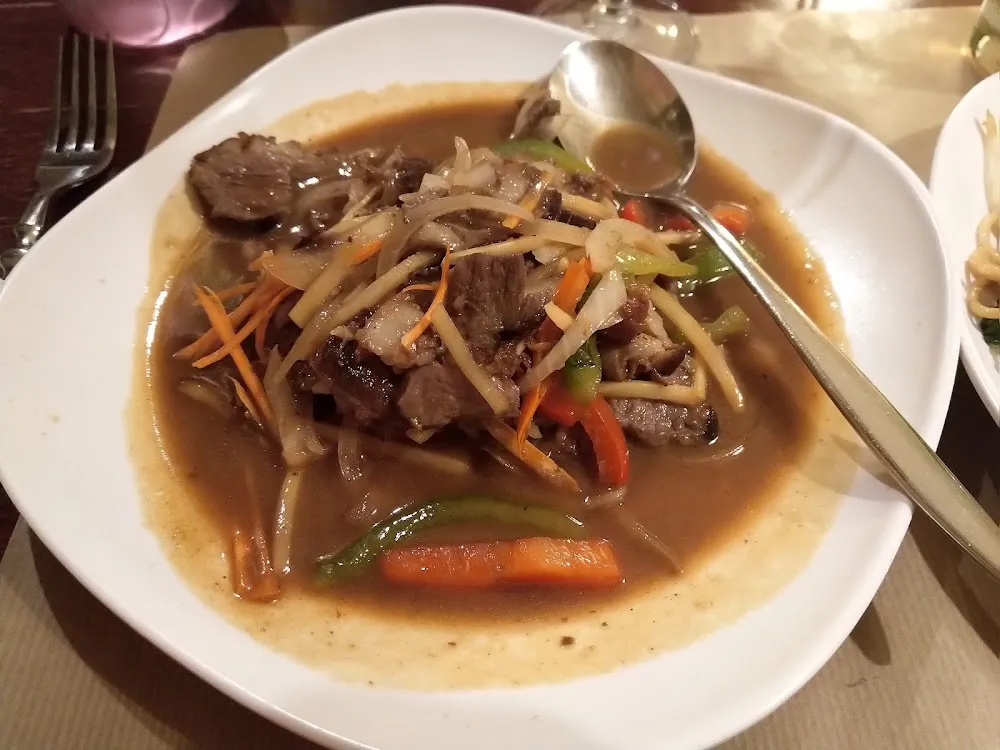 Canard Au Curry Rouge